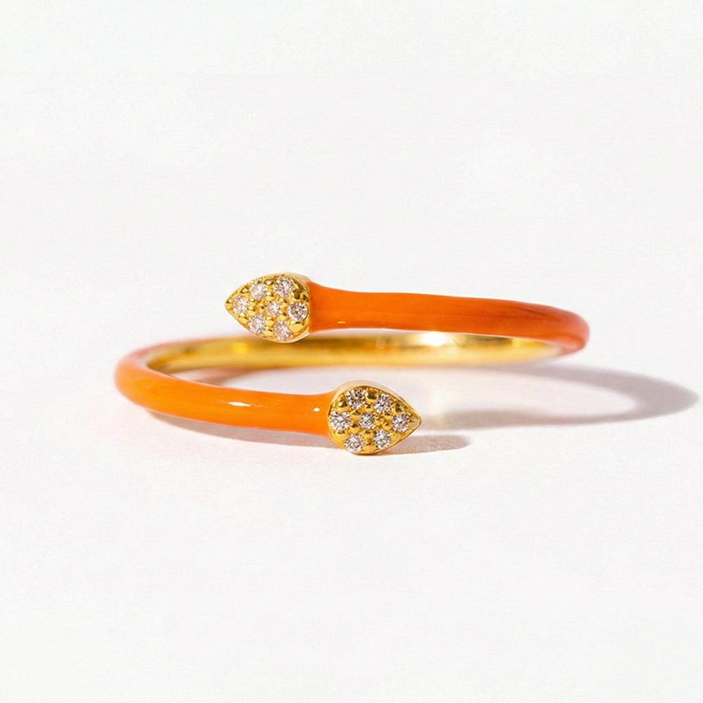 Orange bangle with gold accents on a white background